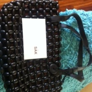 The SAK wood beaded bag